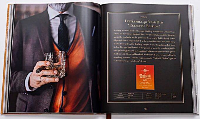 photo of man with his glass of whiskey